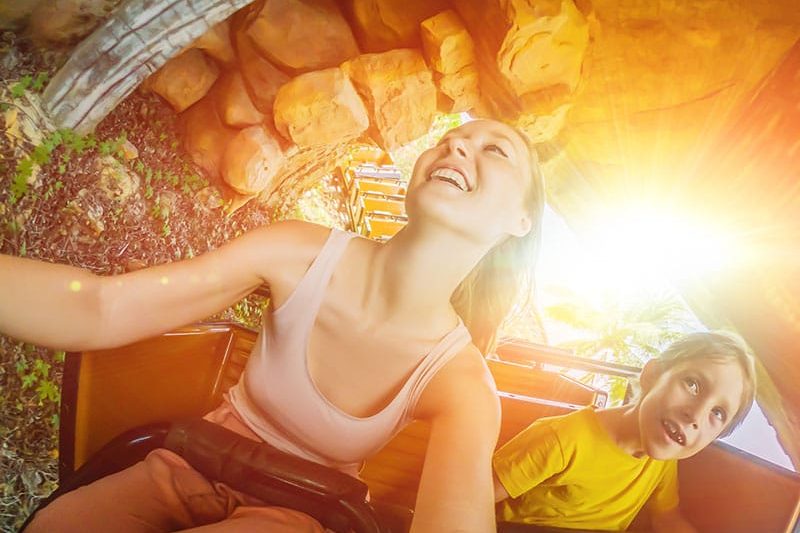 Mother And Son At A Theme Park
